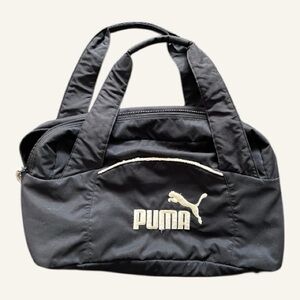 Black and cream Puma gym bag